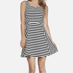 Flirty black and white striped fit and flare dress by Express, size small
